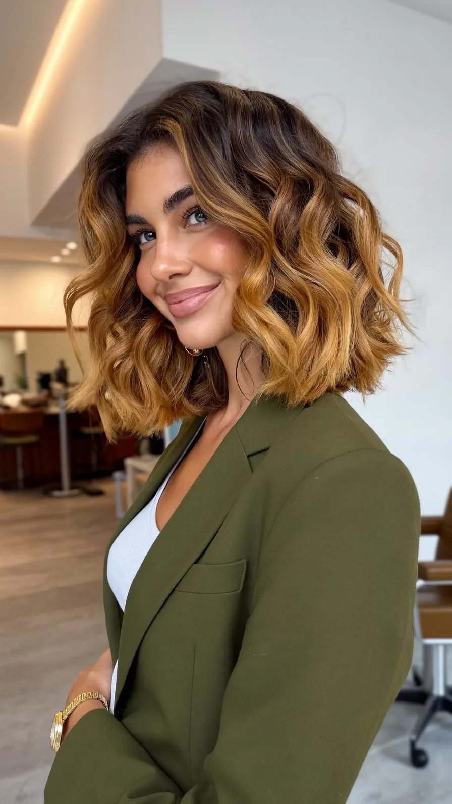 Voluminous Wavy Lob with Warm Caramel Balayage Highlights