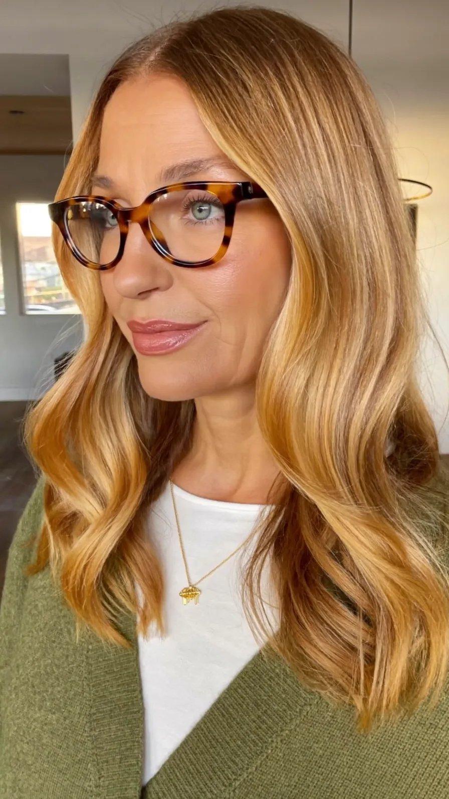 Soft Honey Blonde Shoulder-Length Layers with Subtle Waves