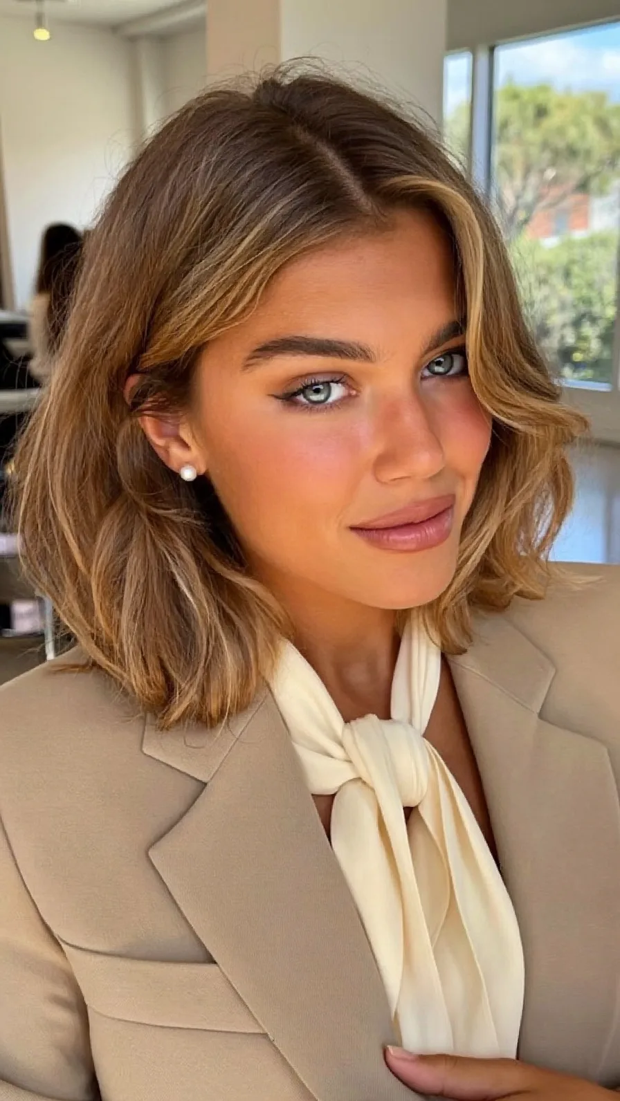 Elegant Shoulder-Length Warm Caramel Brown Balayage Hairstyle