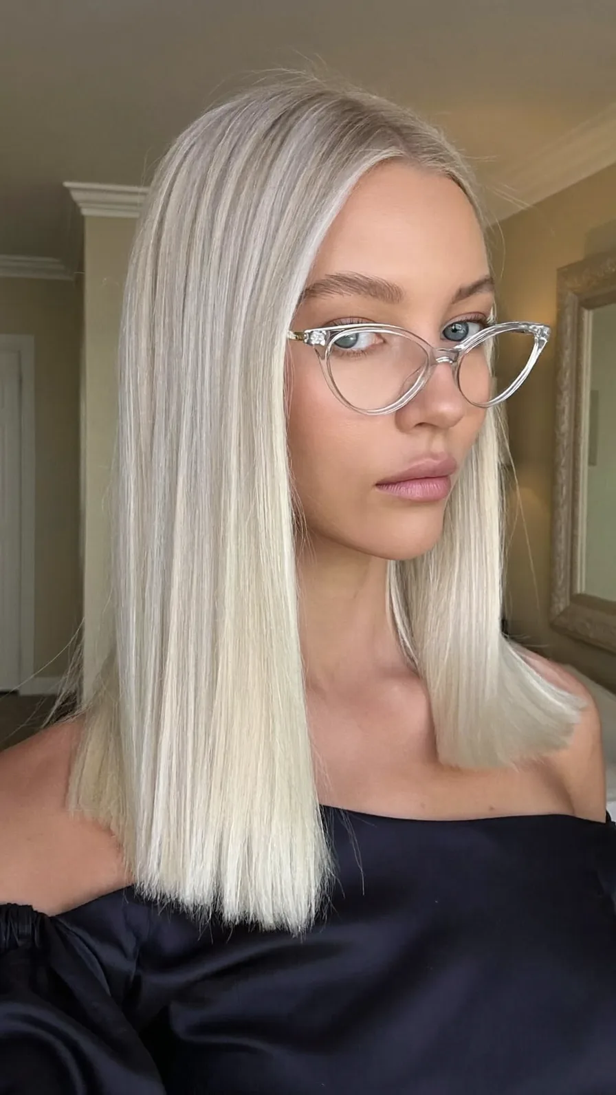 Sleek Platinum Blonde Blunt Bob with Center Part