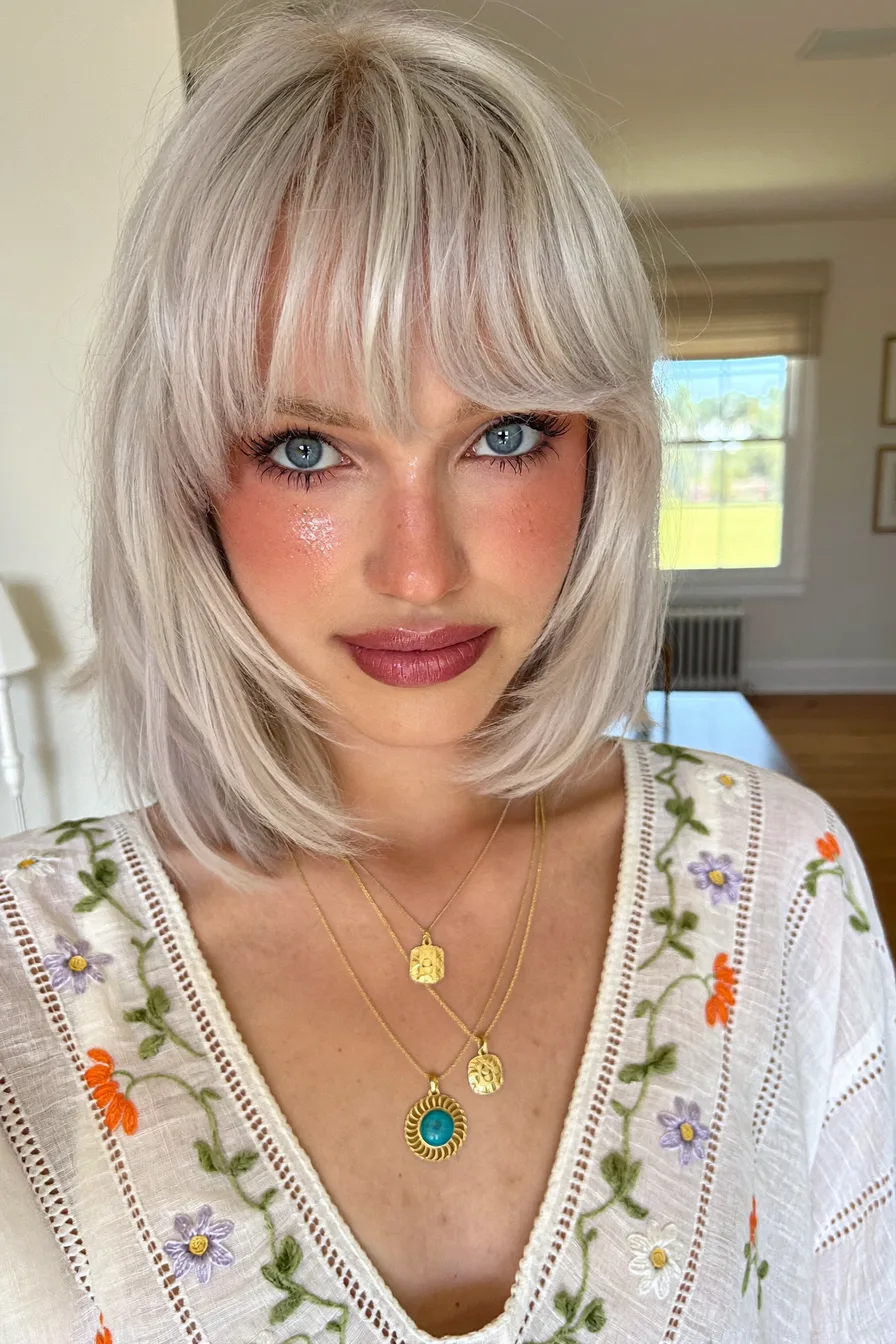 Modern Textured Shoulder-Length Lob with Curtain Bangs