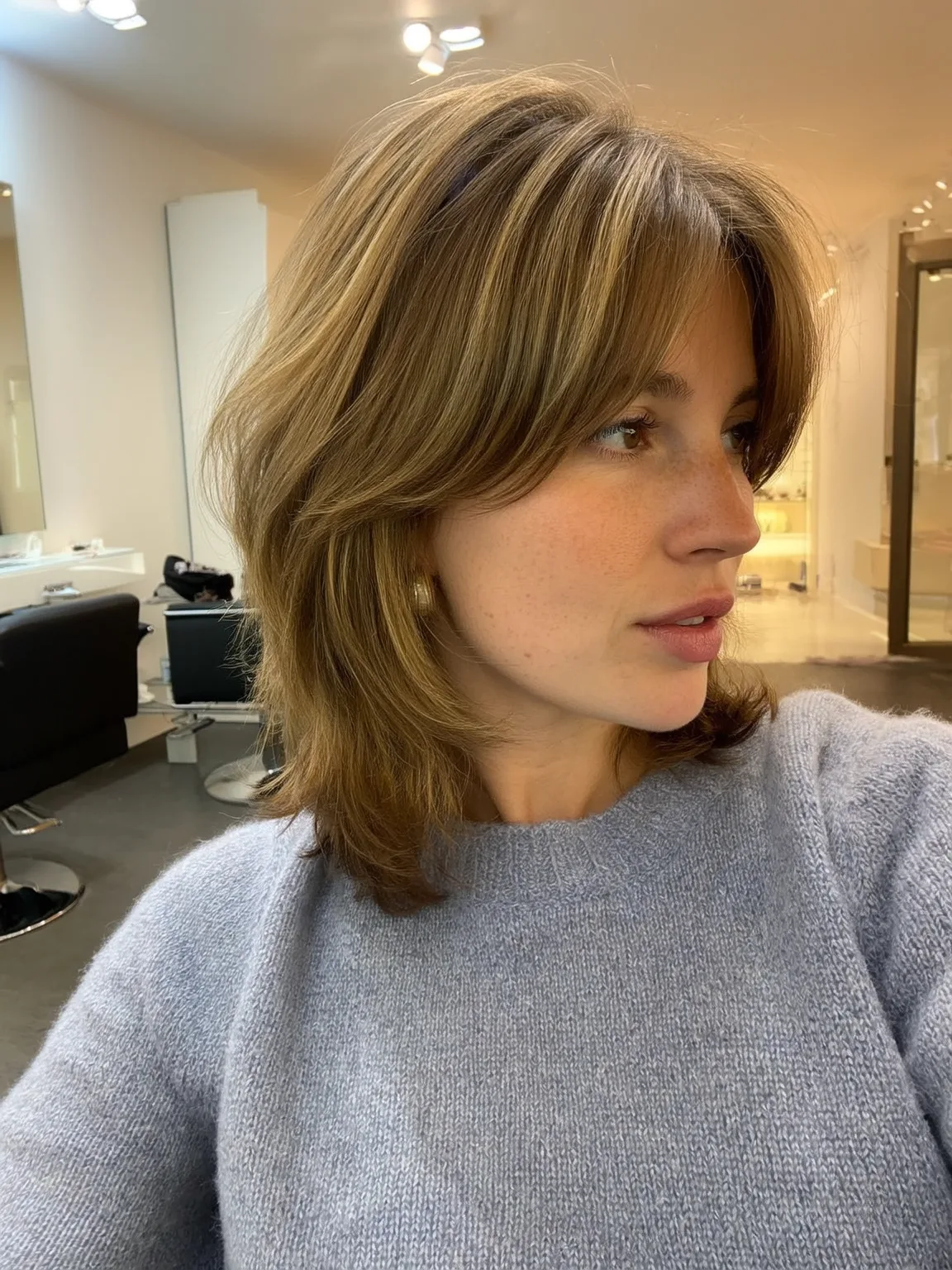 Soft Caramel Balayage Shag with Curtain Bangs