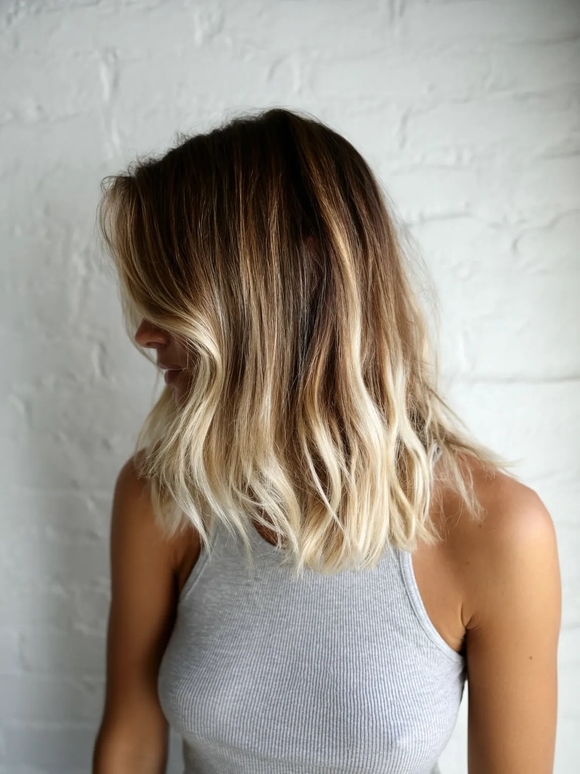 sun-kissed blonde with subtle brunette undertones lob