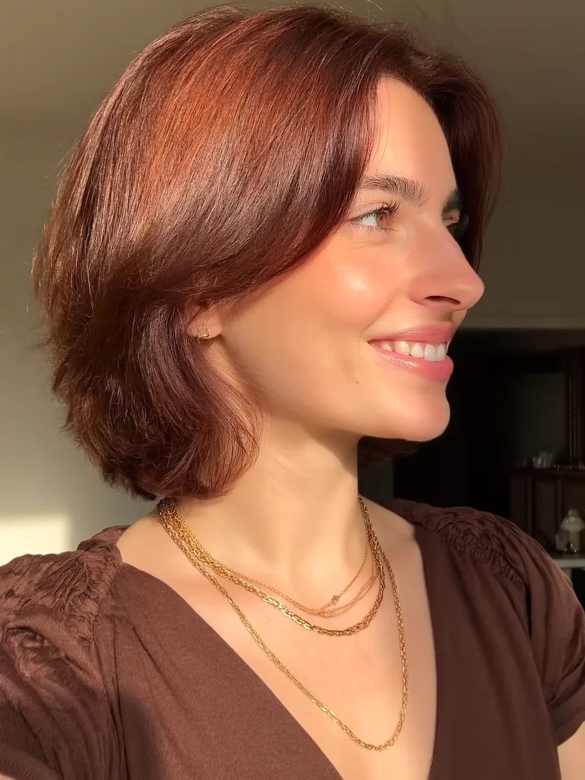 Warm Auburn Wavy Chin-Length Bob with Soft Layers