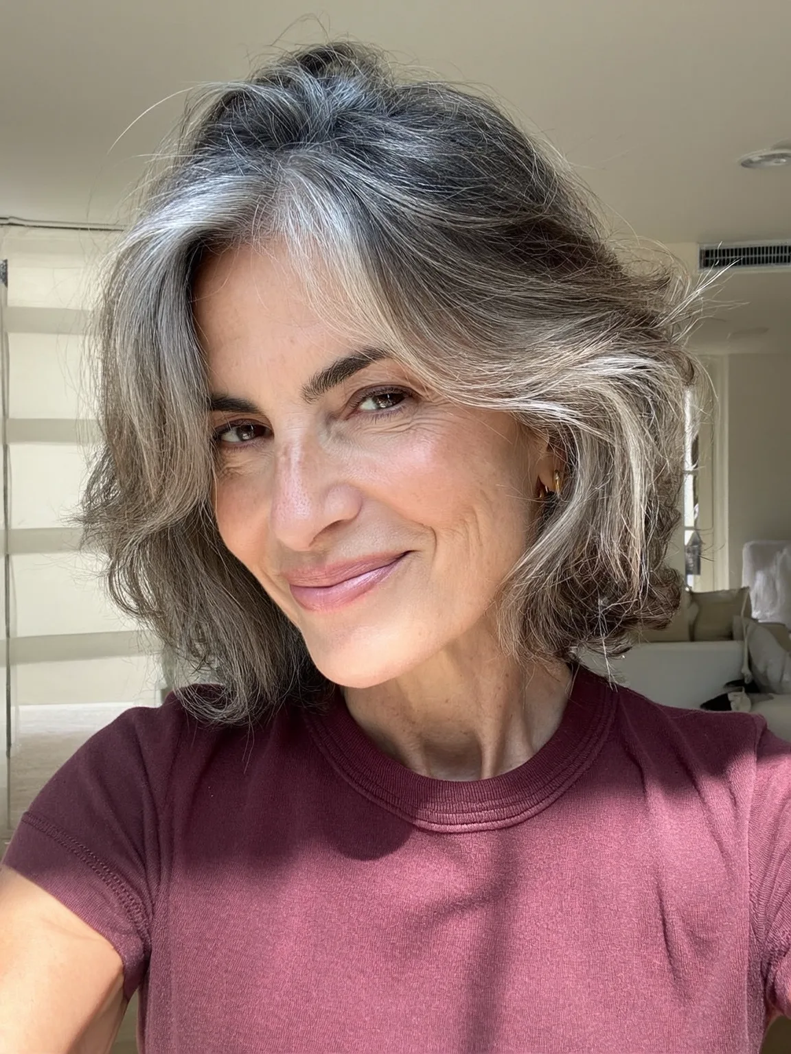 Wavy Silver Frost Bob with Side-Swept Fringe