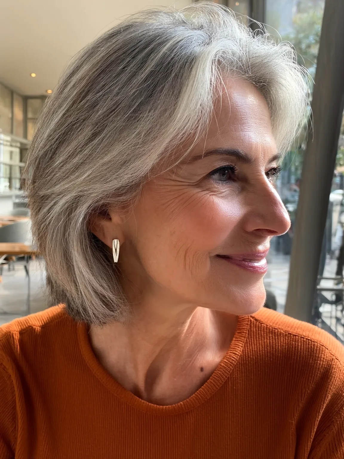 Chic Silver-Grey Chin-Length Bob with Versatile Styling
