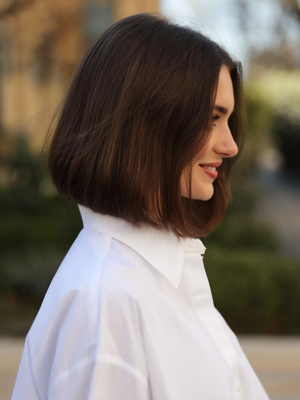 Chocolate Brown Chin-Length Bob with Long Bangs