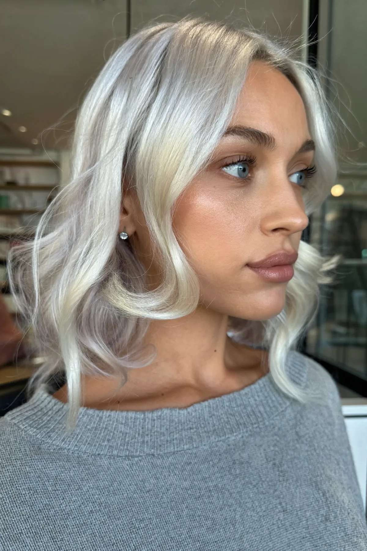 Modern Silver Balayage Waves with Soft Curtain Bangs for Chic Style