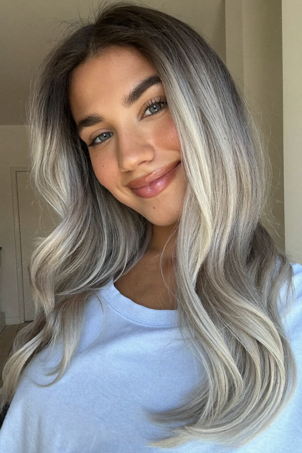 Dimensional Silver Balayage Hair with Soft Long Layers for Modern Shine