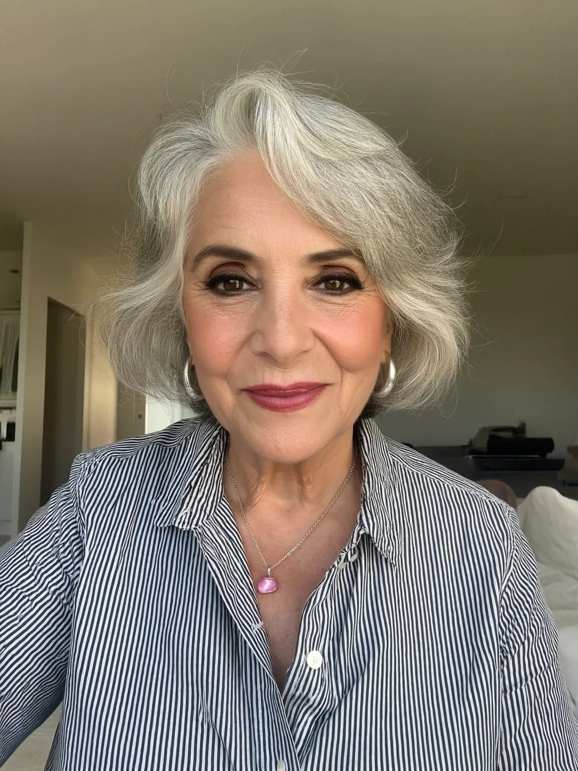 Wavy Silver Frost Bob with Side-Swept Bangs