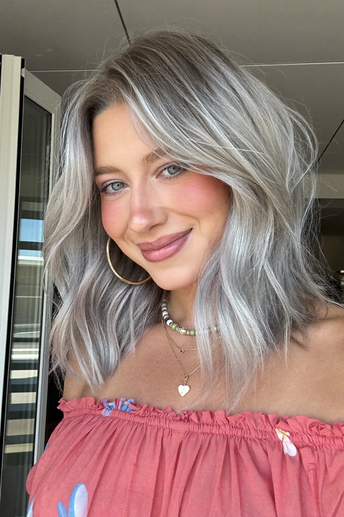 Modern Silver Fox Balayage with Face-Framing Curtain Bangs