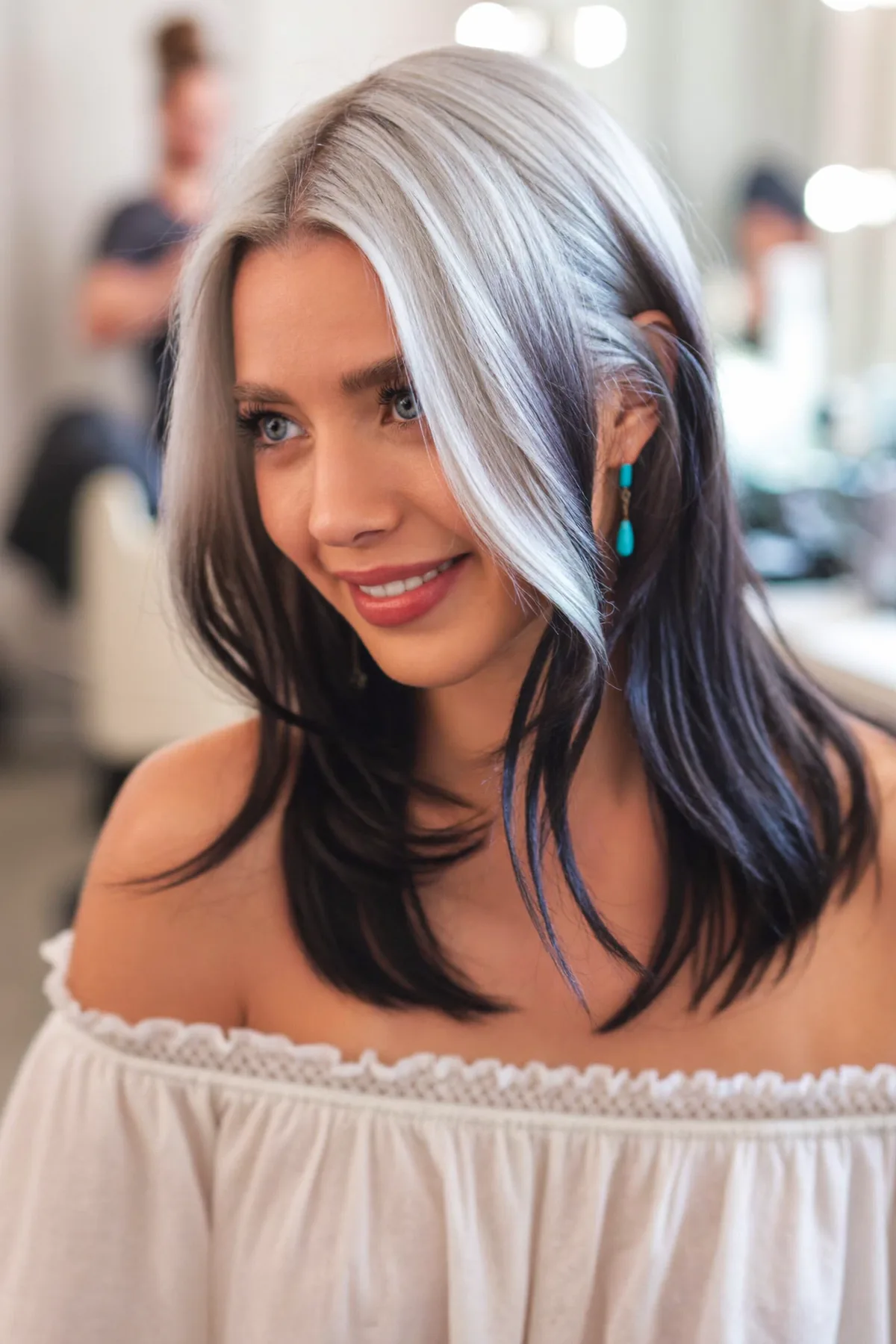 Sleek Silver Fox Hairstyle with Flowing Long Layers for Modern Glam