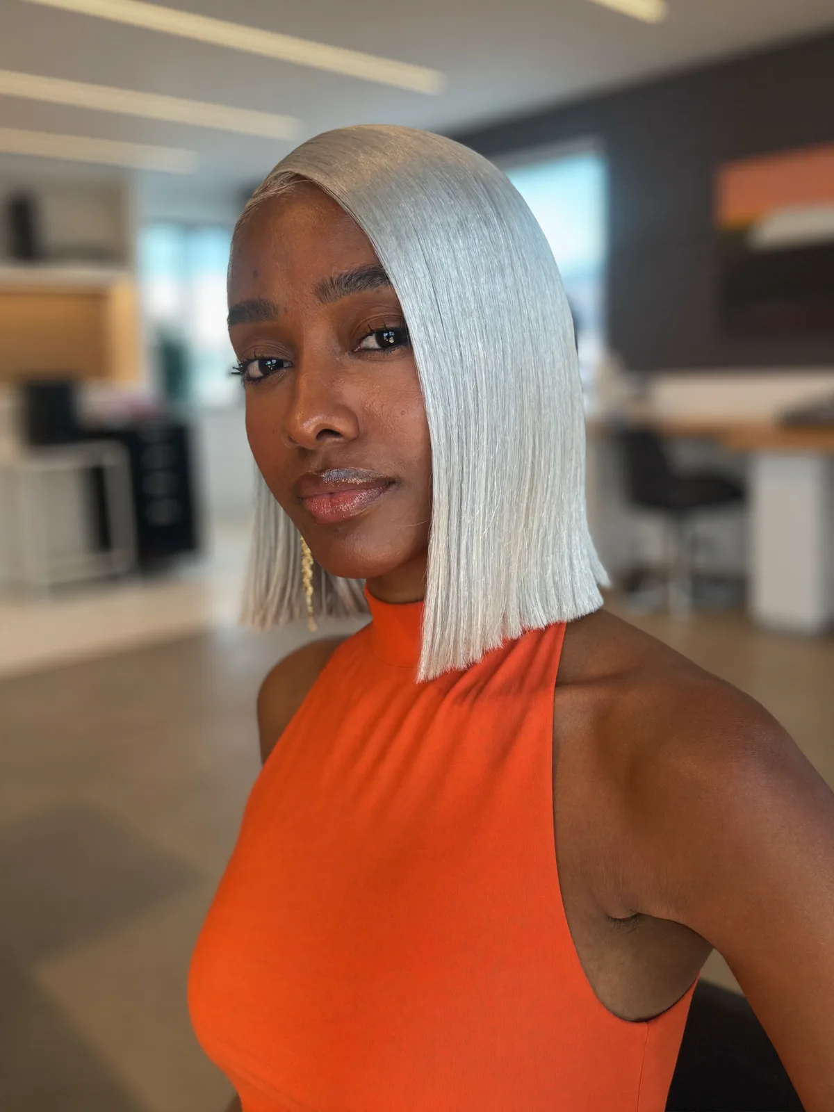Sleek Silver Frost Precision Bob with Sharp Blunt Ends