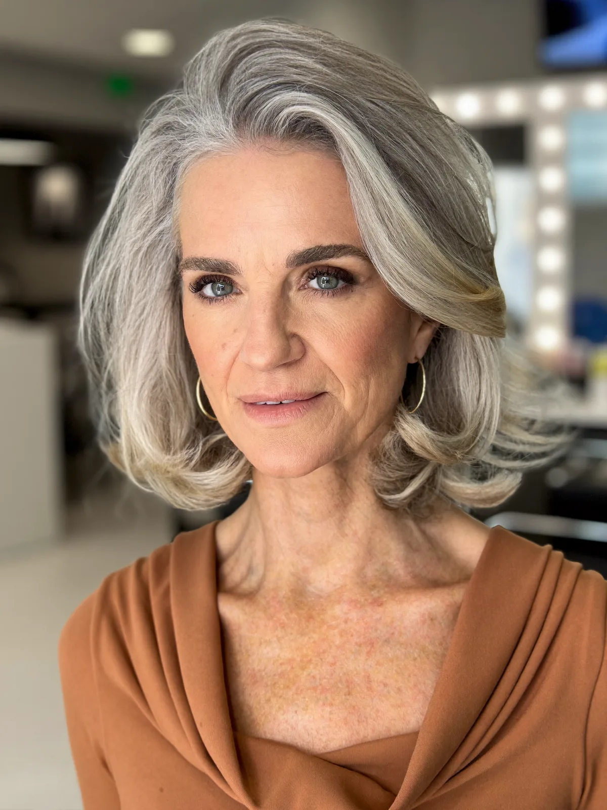 Silver Frost Layered Bob with Soft Face-Framing Volume