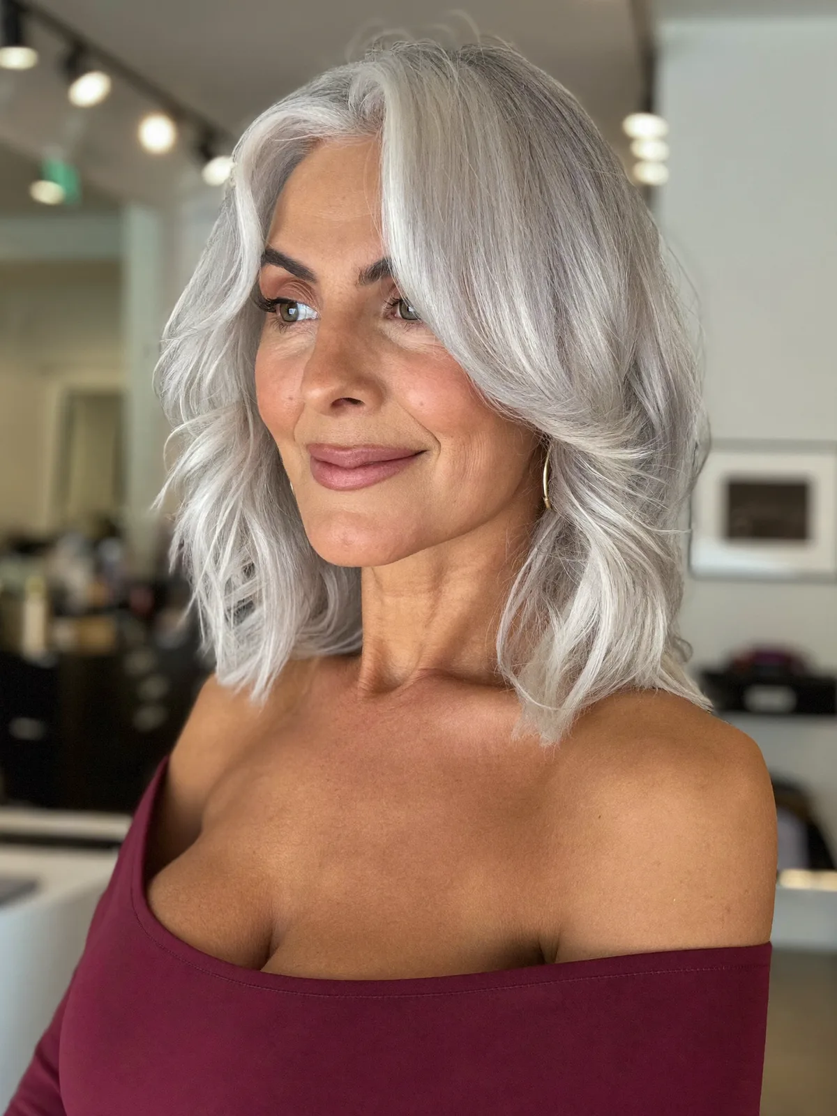 Silver Frost Layered Bob with Voluminous Face-Framing Waves