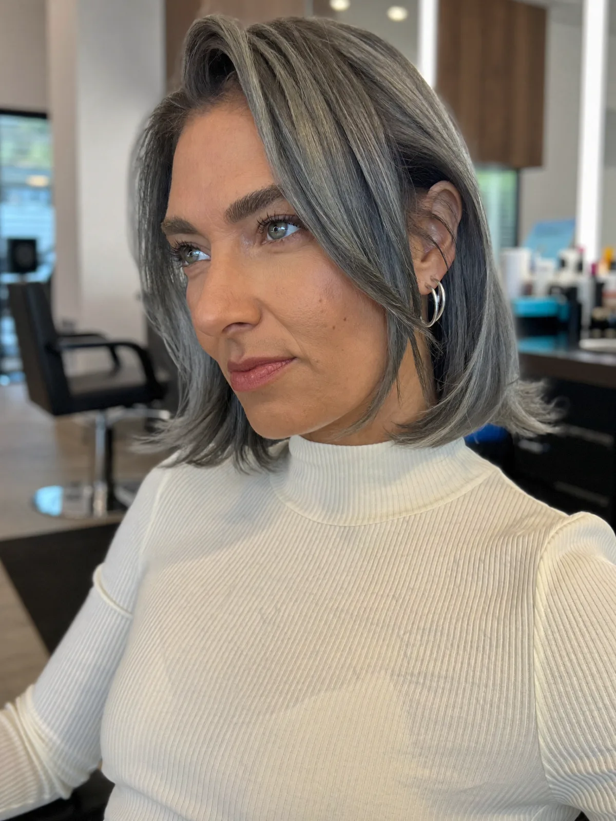 Modern Silver Frost Bob with Soft Face-Framing Layers and Volume