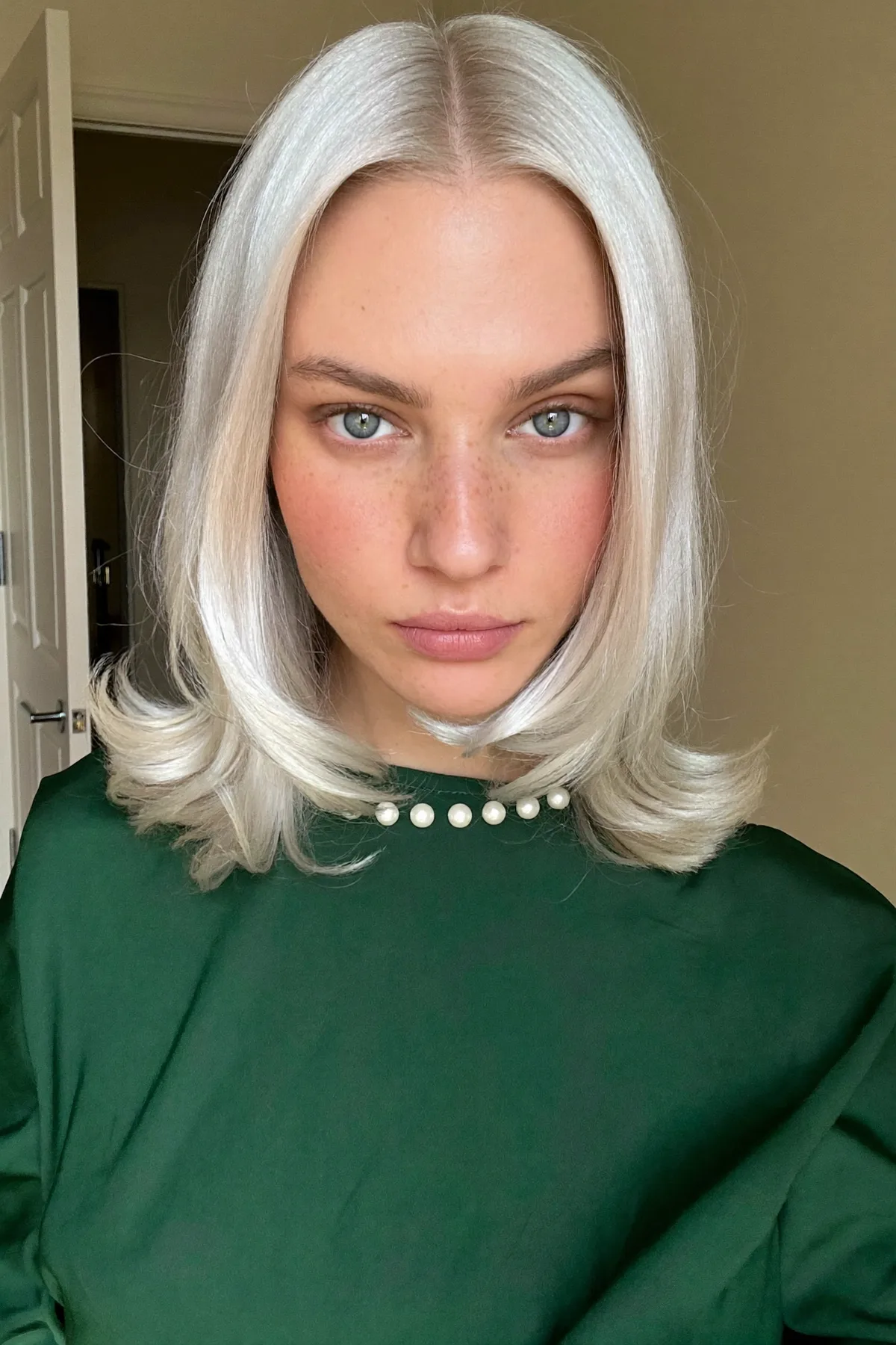 Silver Frost Long Bob with Soft Outward Layers and Center Part