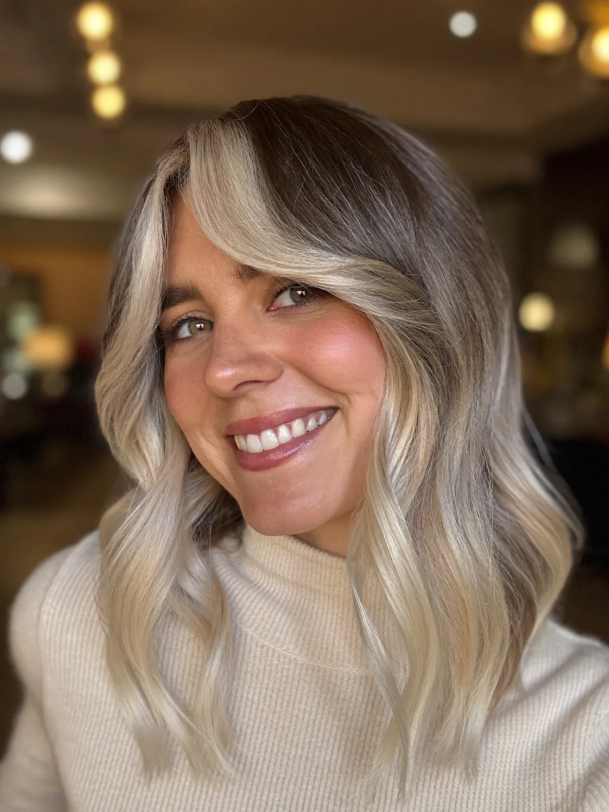 Silver Frost Balayage with Soft Face-Framing Waves and Layers
