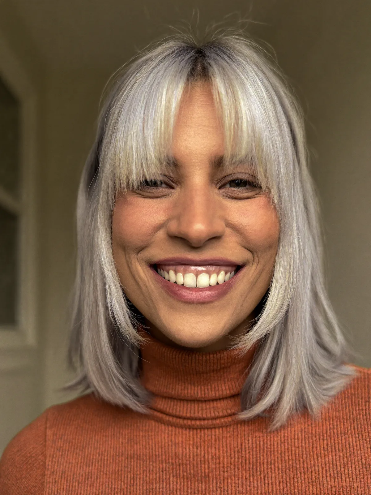 Silver Frost Lob With Soft Curtain Bangs and Sleek Texture