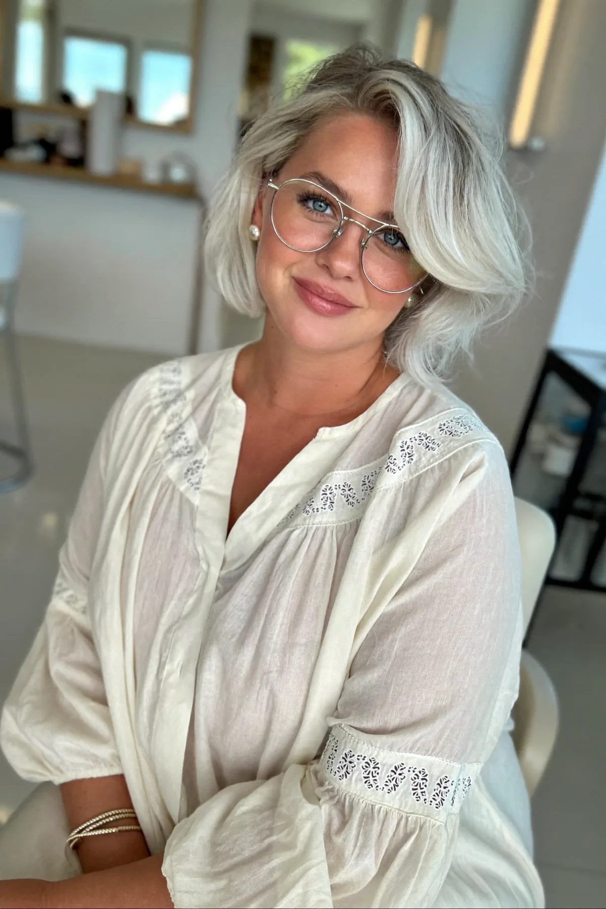 Silver Frost Bob with Voluminous Side-Swept Layers