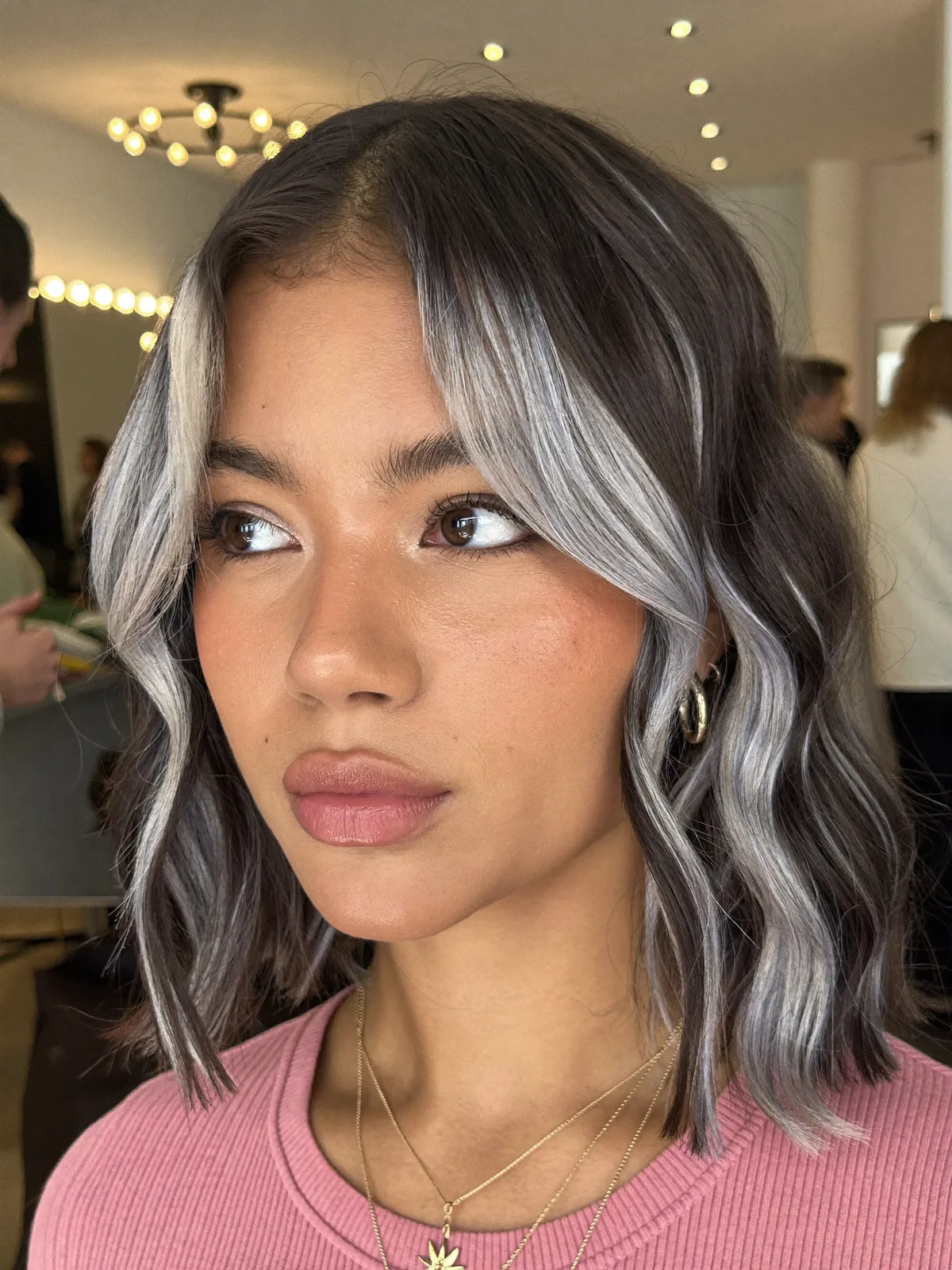 Silver Frost Face-Framing Highlights on Soft Wavy Lob