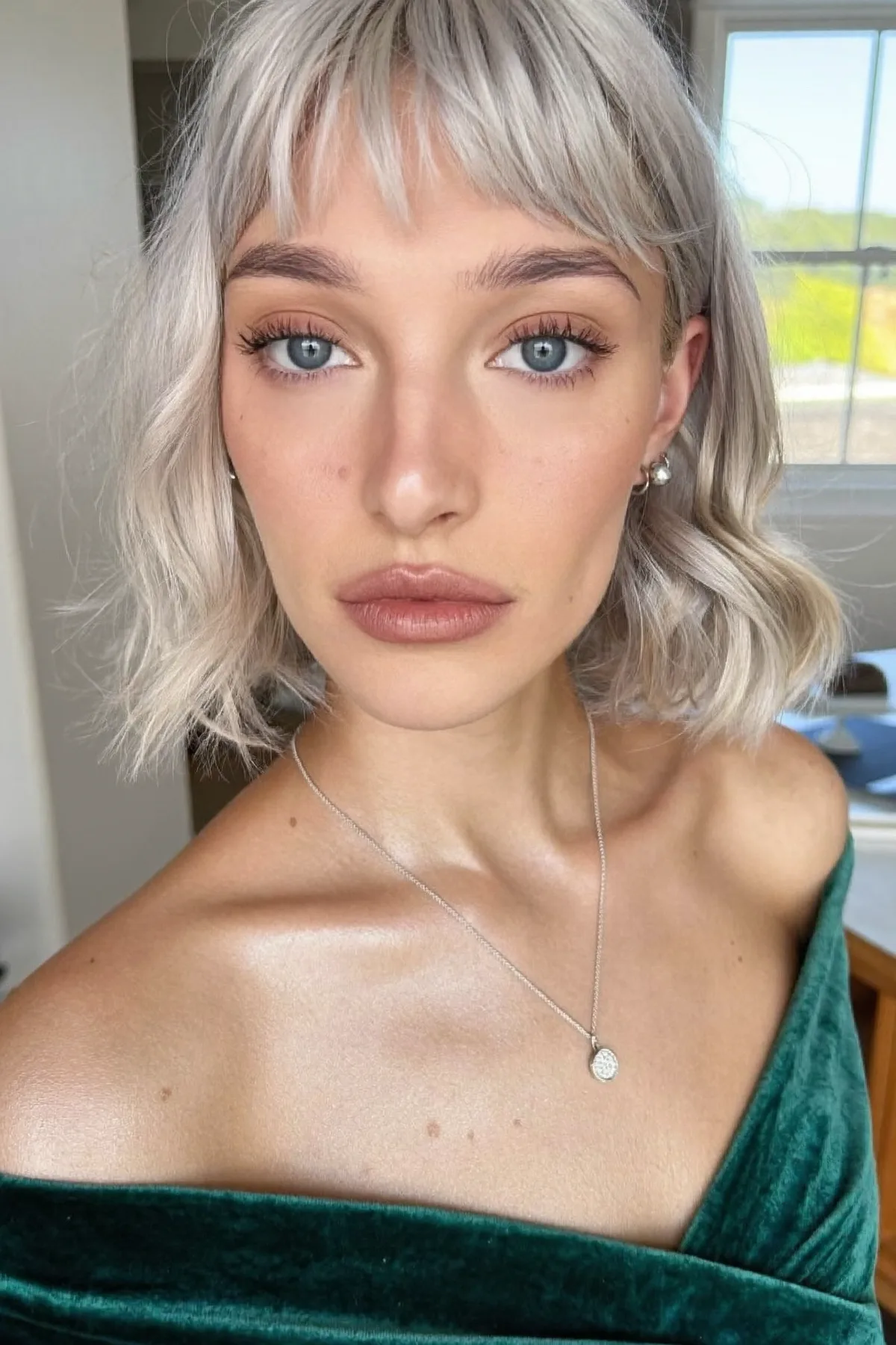 Chic Silver Frost Wavy Bob with Soft Textured Bangs