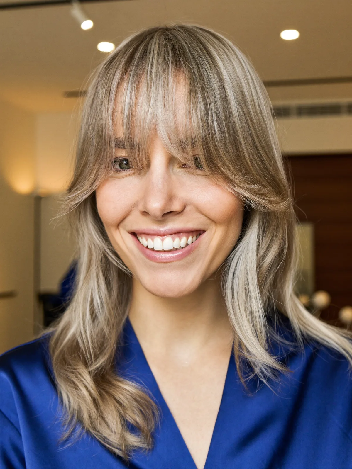 Silver Frost Long Layers with Curtain Bangs for Modern Elegance