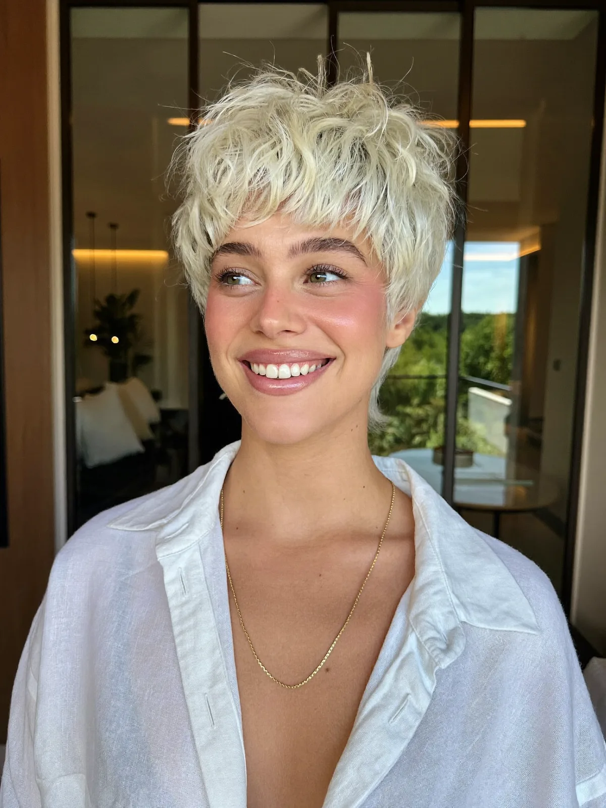 Textured Silver Frost Pixie Cut with Feathered Layers