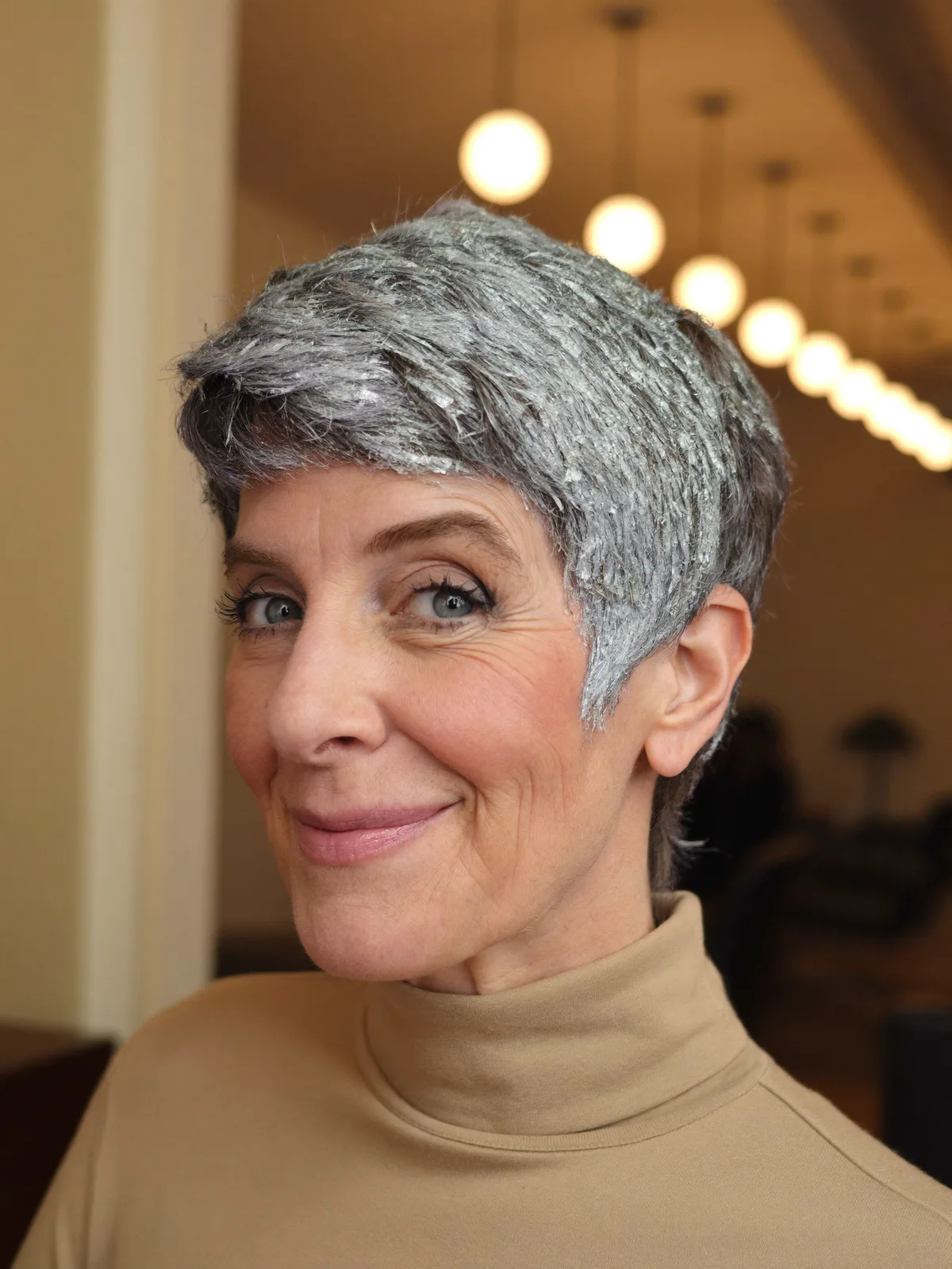 Textured Silver Frost Pixie Cut with Side-Swept Bangs