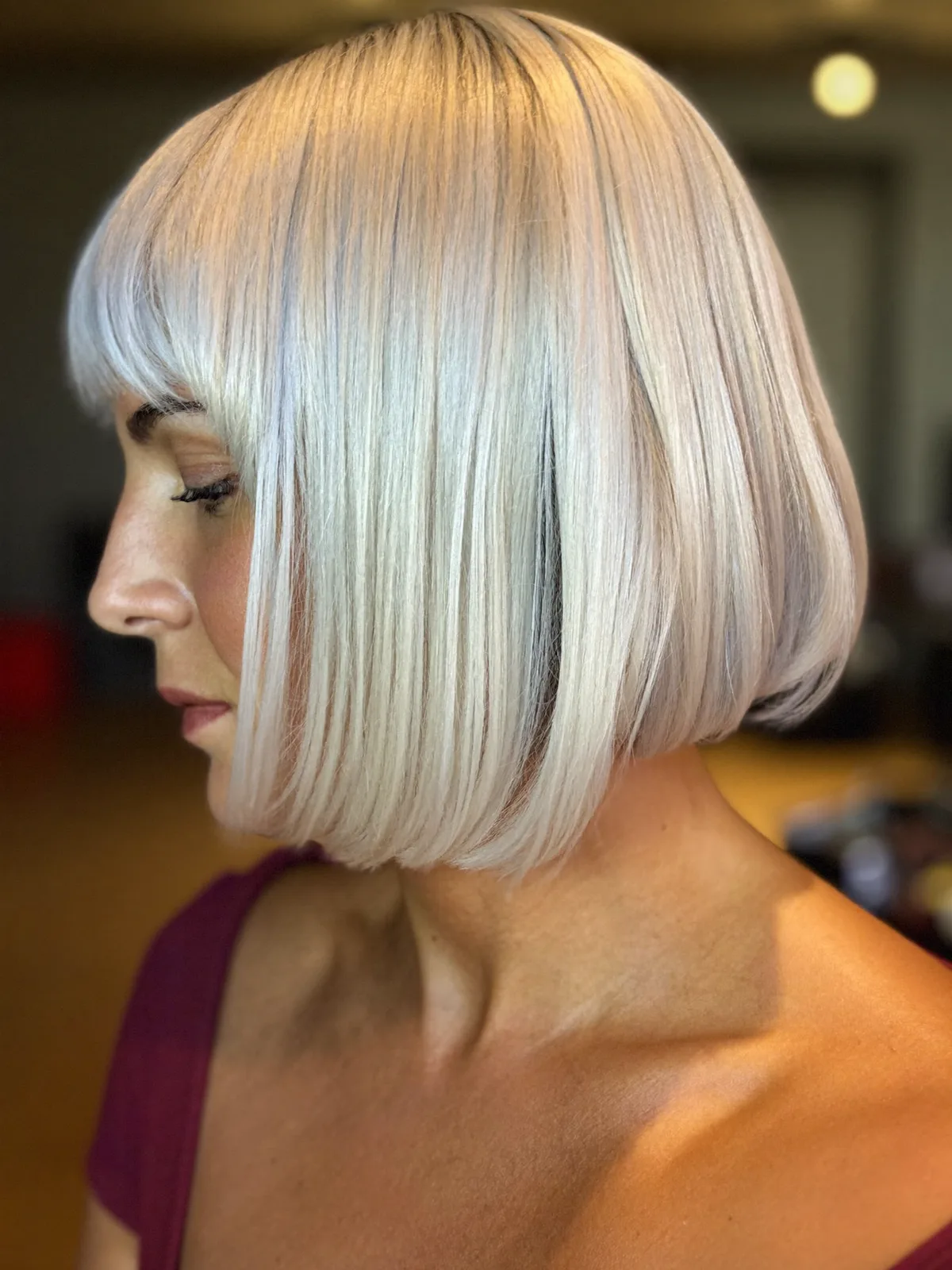Silver Frost Jaw-Length Bob with Blunt Fringe and Sleek Finish