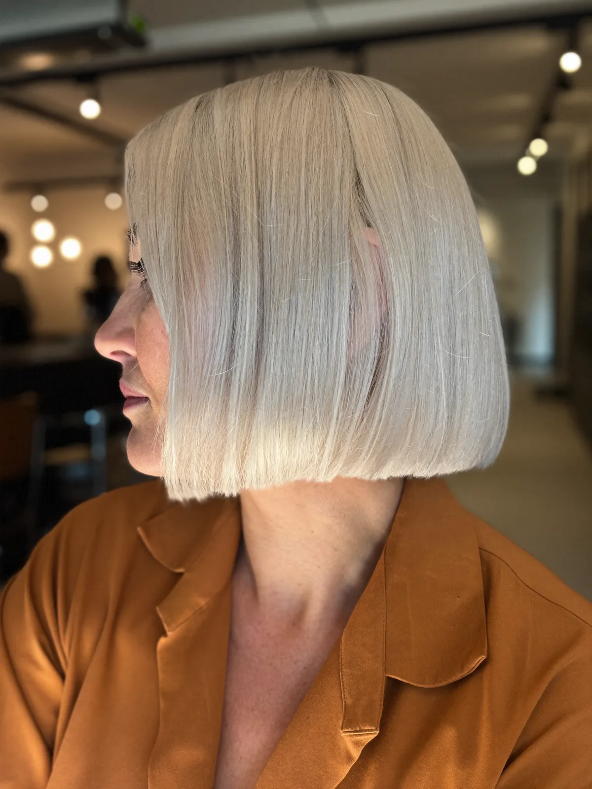 Sleek Silver Frost Blunt Bob with Soft Face-Framing