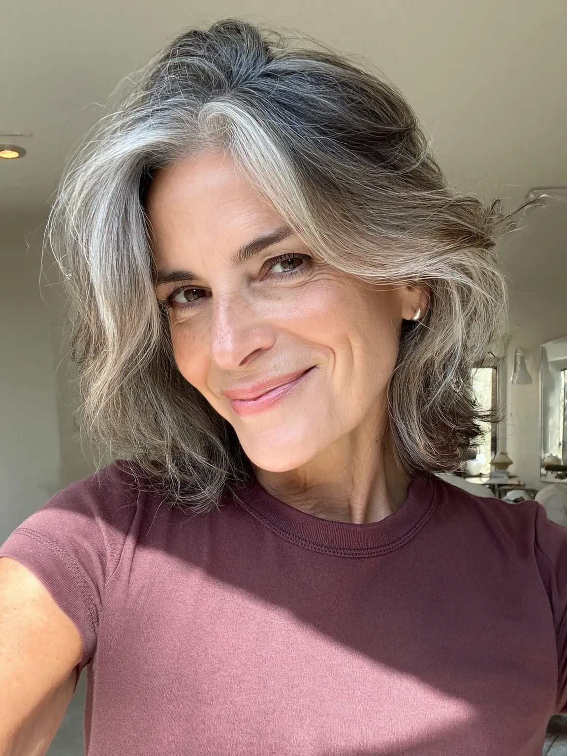 Voluminous Shoulder-Length Silver with Gray-Blonde Highlights