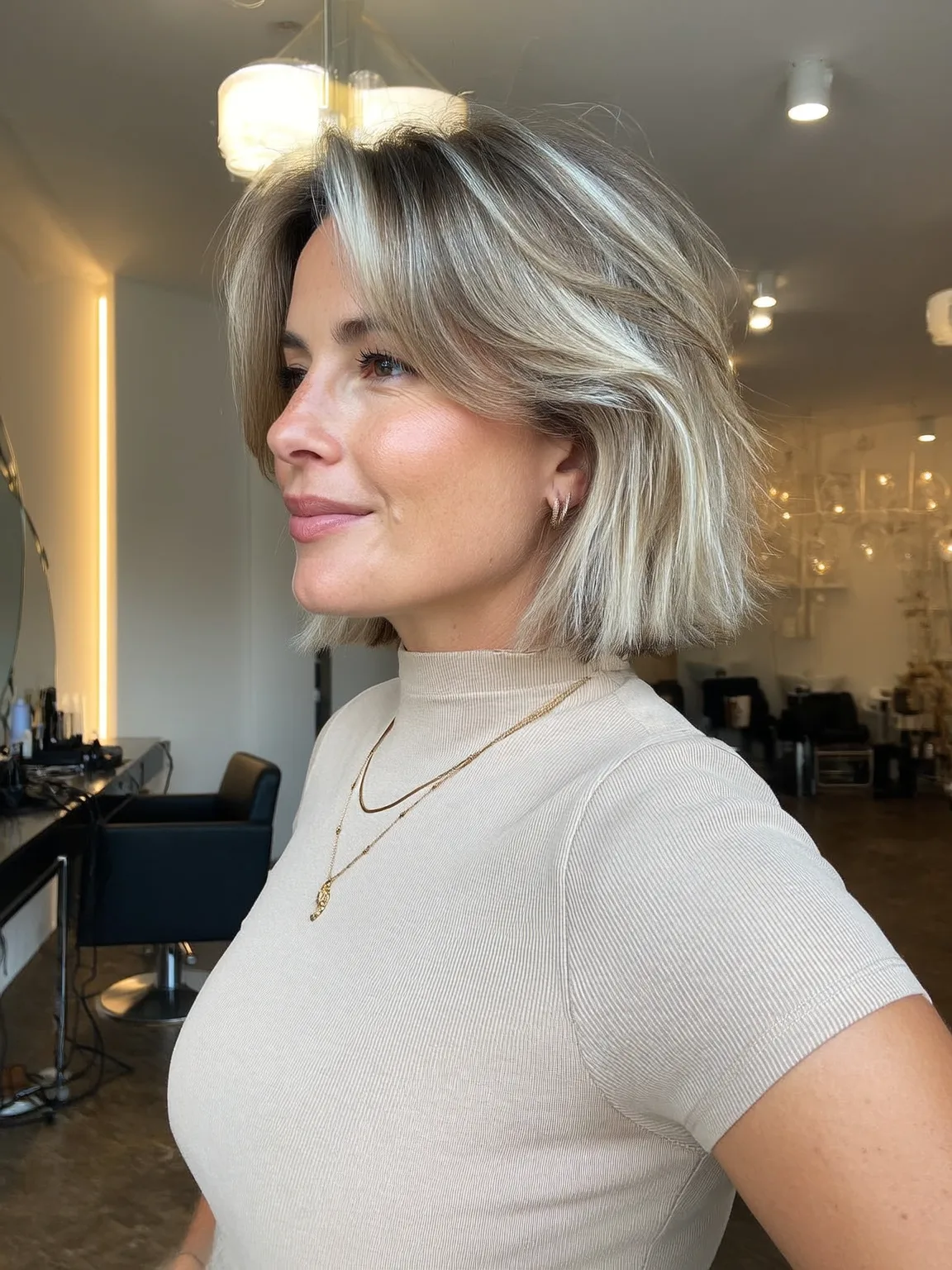 Chin-Length Wavy Bob with Cool Ash Blonde and Silver Highlights