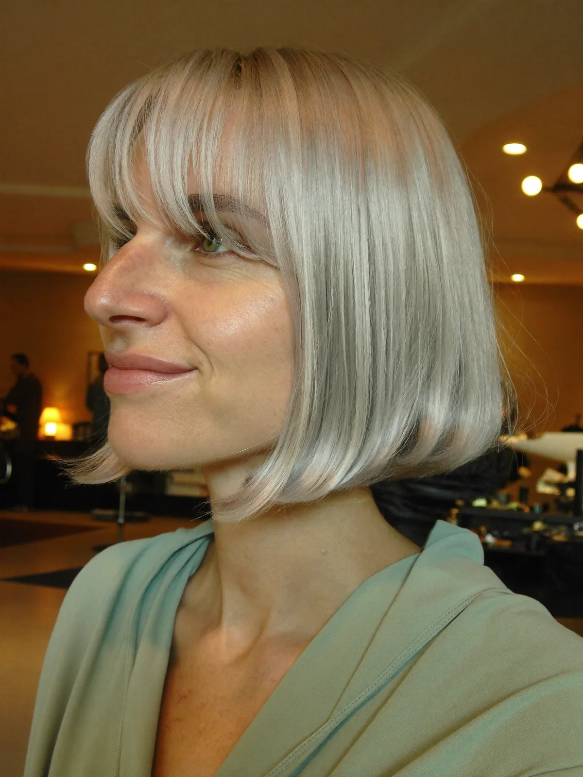 Platinum Silver Bob with Soft Curtain Bangs for Elegant Framing