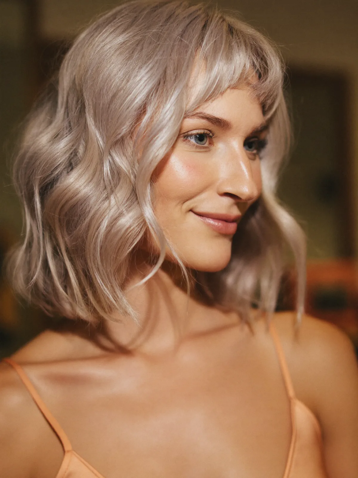 Chic Wavy Silver Bob with Soft Curtain Bangs for Face Framing