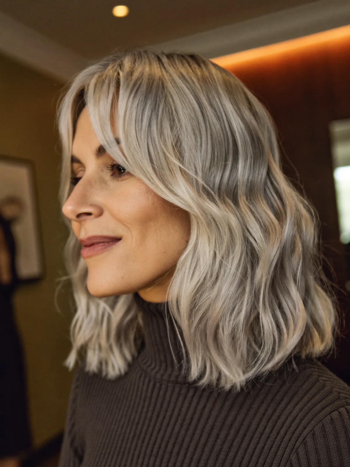Textured Silver Waves with Soft Curtain Bangs for Face-Framing Elegance
