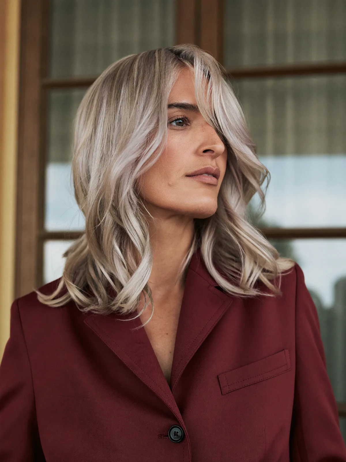 Platinum Silver Layered Waves with Soft Curtain Bangs for Movement