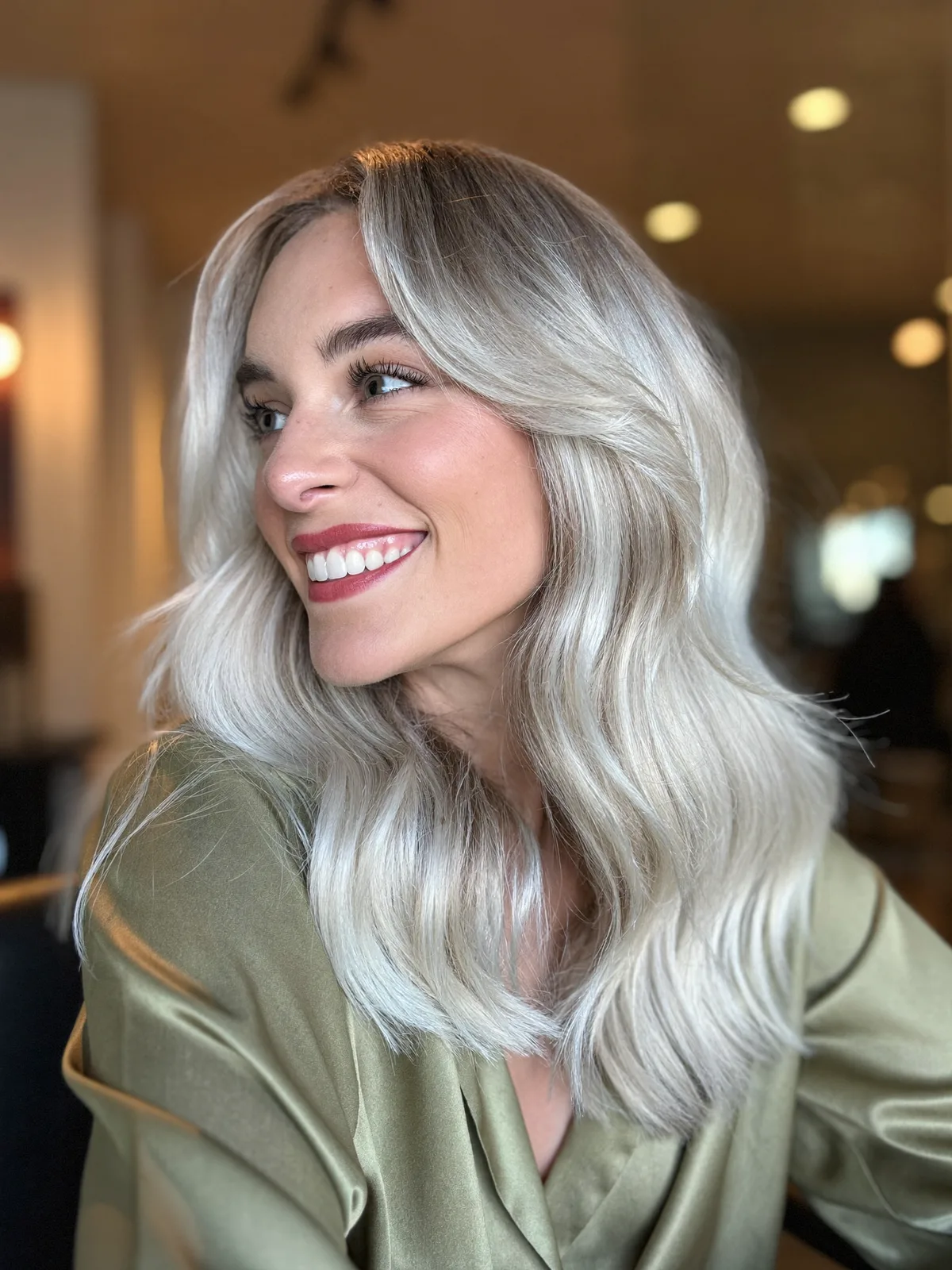 Platinum Silver Waves with Soft Face-Framing Curtain Bangs