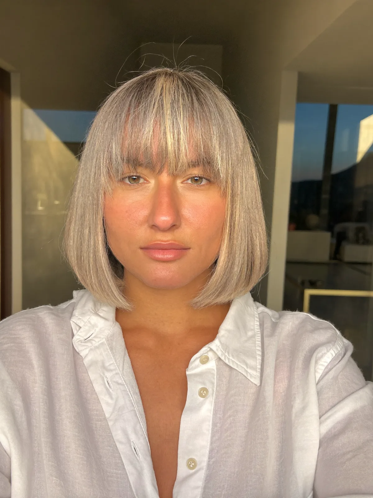 Chic Silver Blonde Bob With Soft Curtain Bangs For Face-Framing