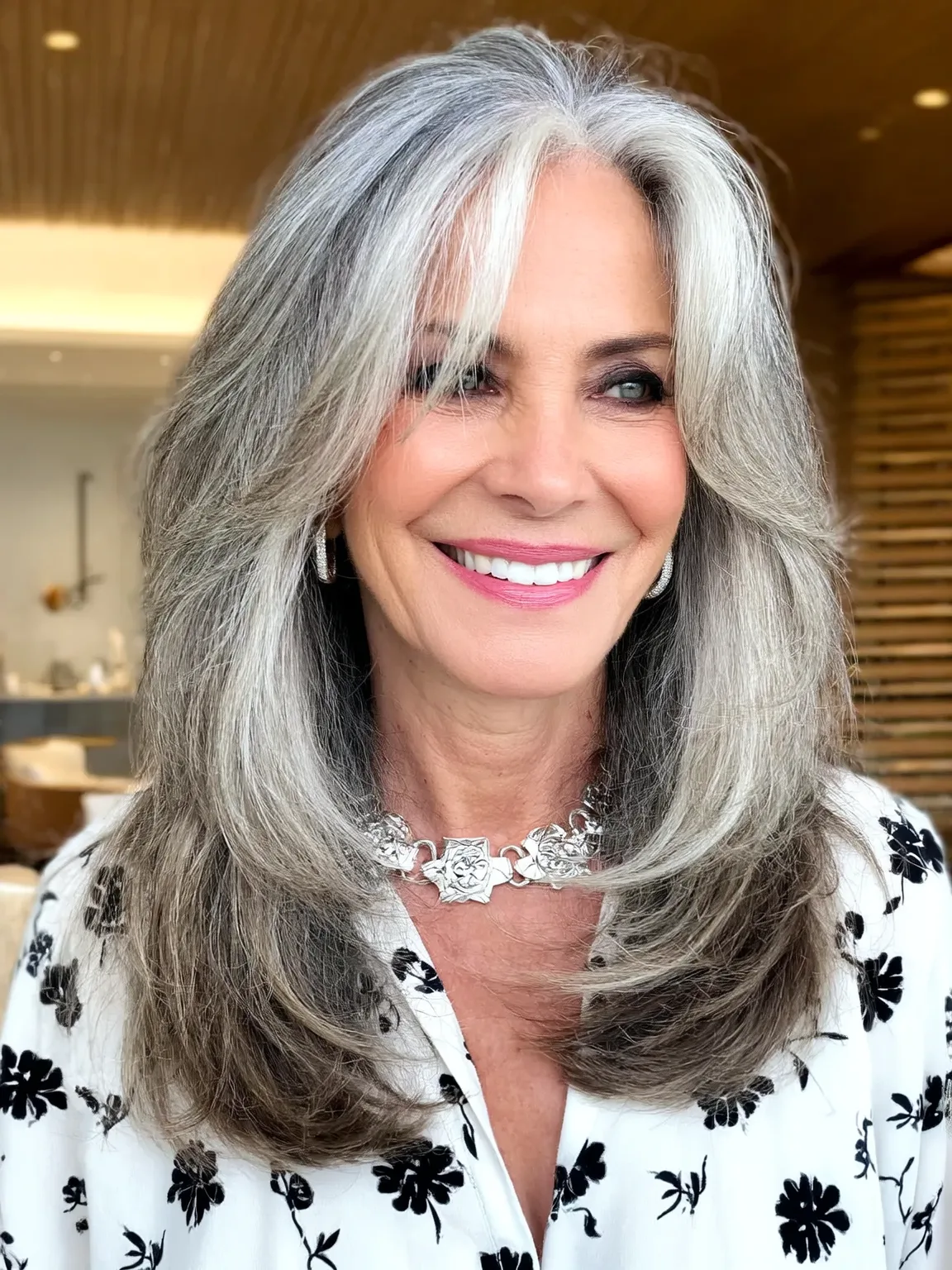 Medium-Length Wavy Silver Frost Layers with Side Bangs