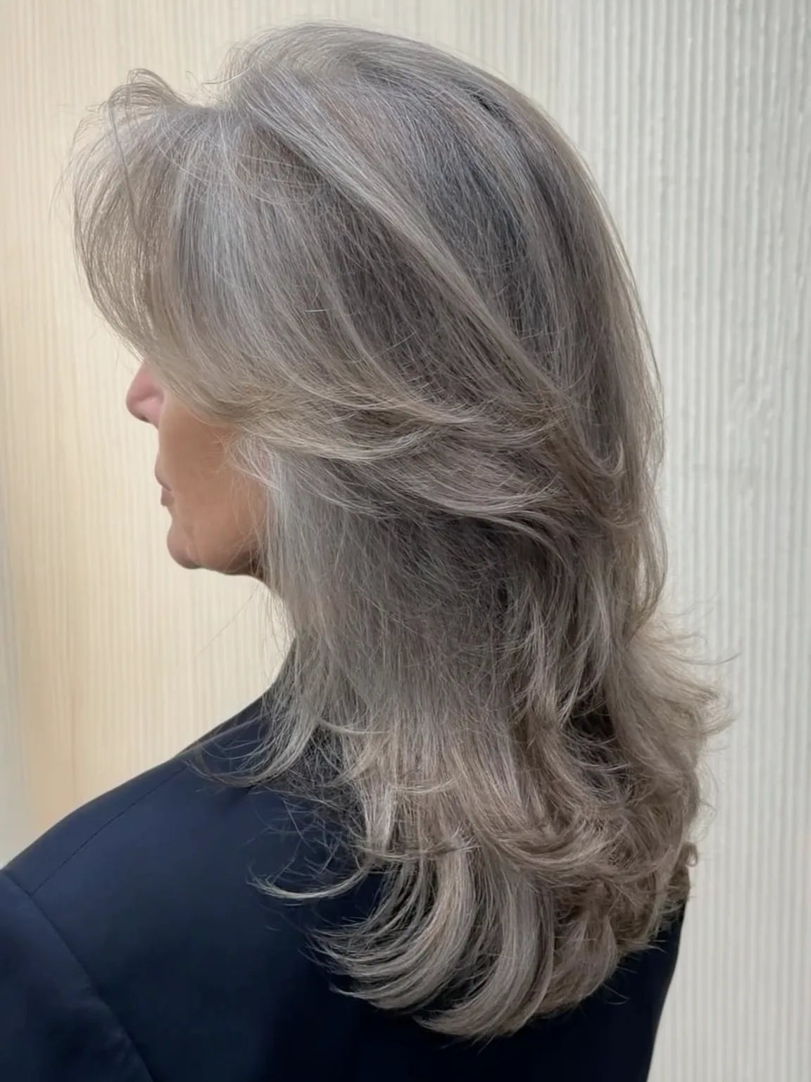 Wispy Bangs on Voluminous Silver Frost Wavy Layers