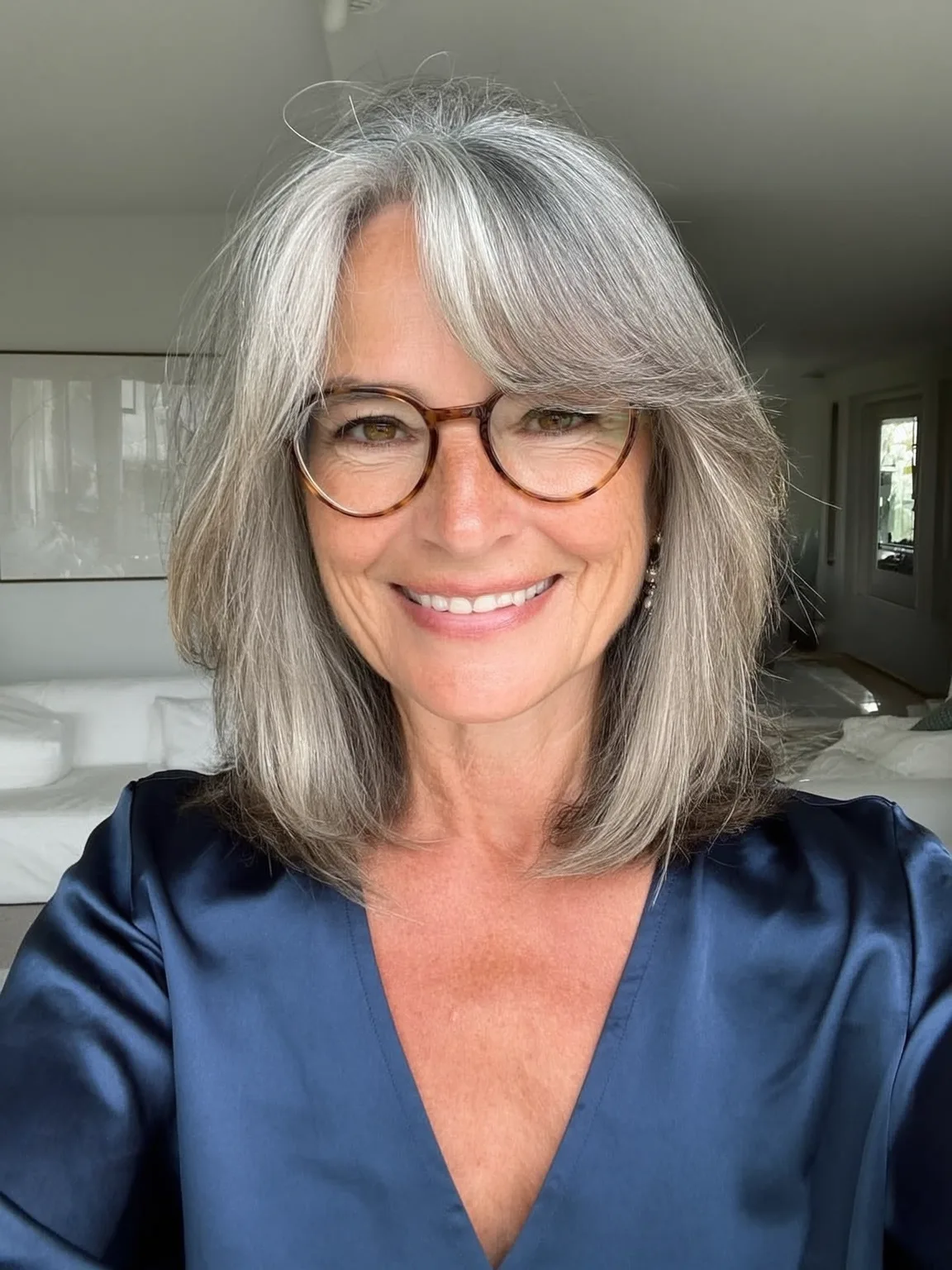 Curtain-Banged Silver Frost Layers with Natural Grey Blending