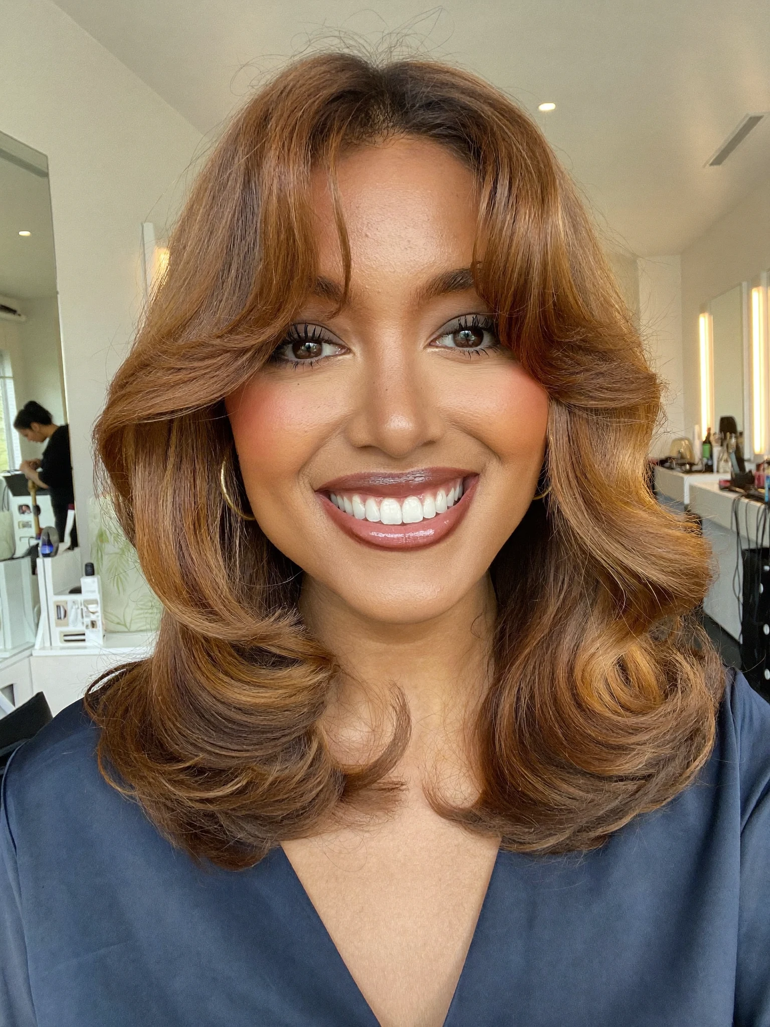 Collarbone-Length Caramel Lob with Curtain Bangs