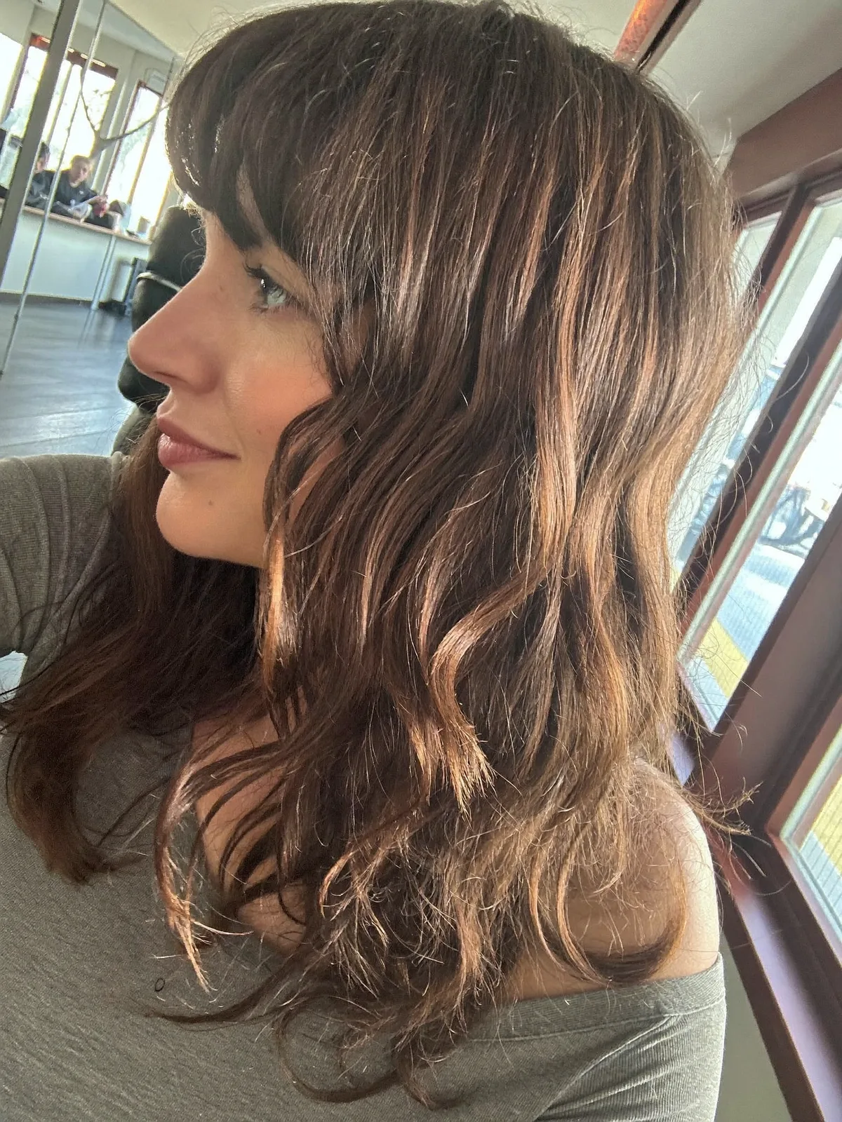 Soft Wolf Cut with Natural Waves and Face-Framing Bangs for Effortless Volume
