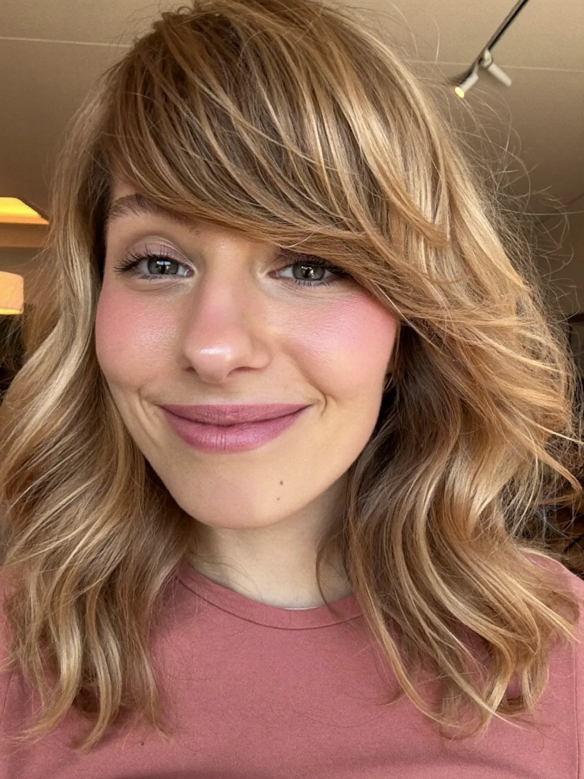 Soft Wolf Cut with Feathered Layers and Face-Framing Bangs