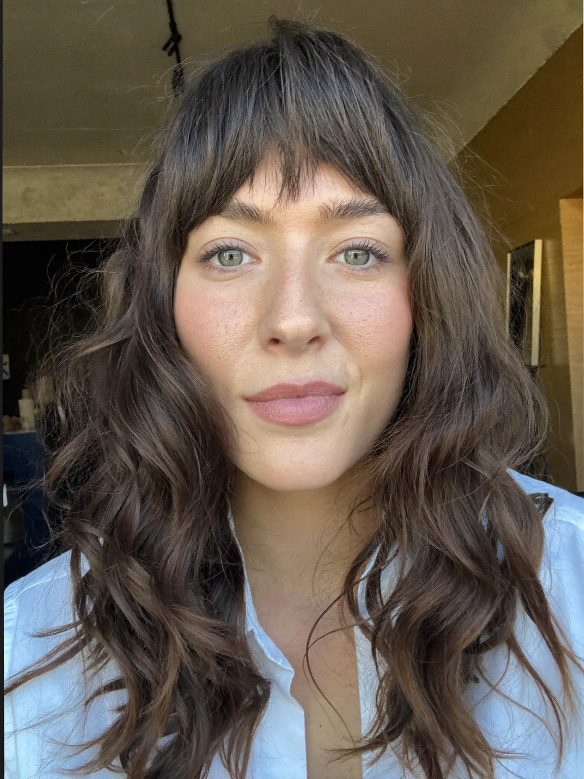 Soft Wolf Cut with Tousled Volume and Wispy Curtain Bangs