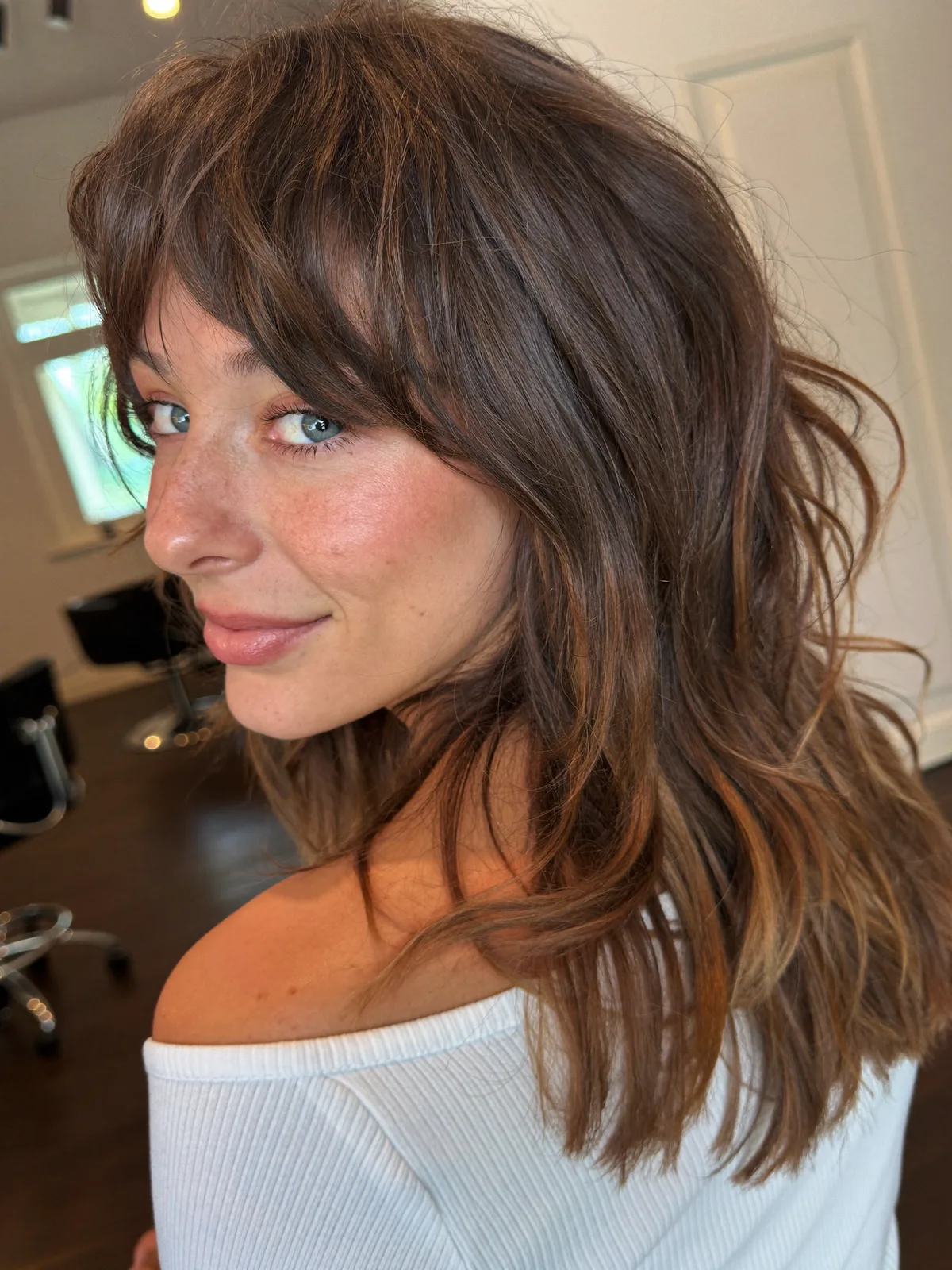 Soft Wolf Cut with Wispy Layers and Face-Framing Bangs for Volume
