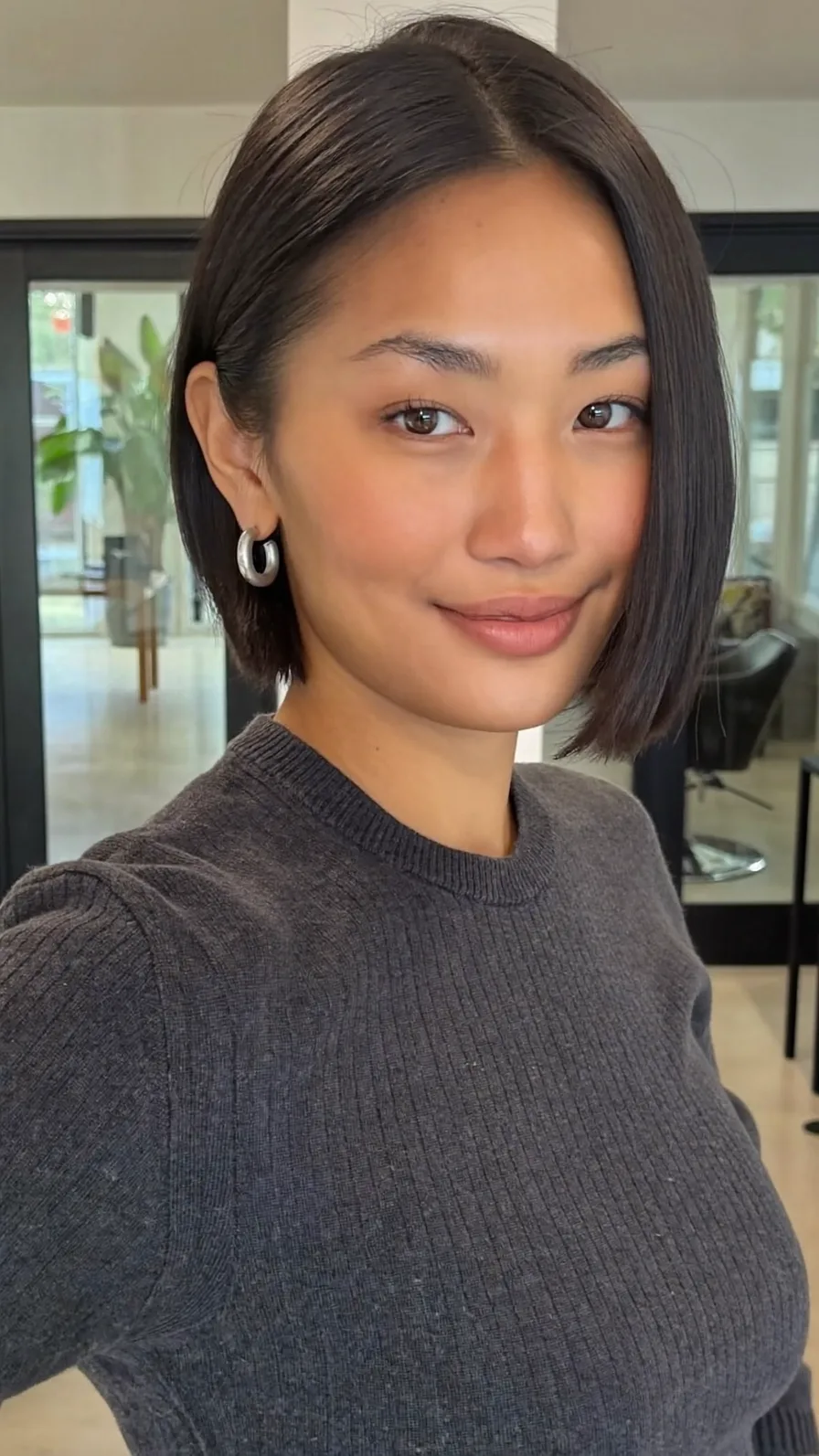 Sleek Chin-Length Straight Bob with Side Part Accents
