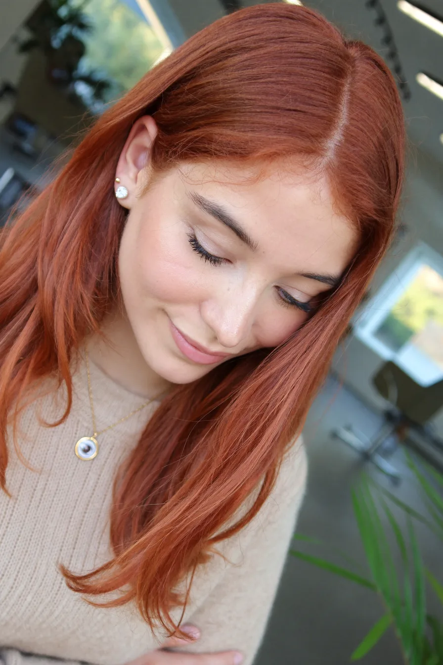 Sleek Straight Bob with Crisp Center Part for Polished Glow