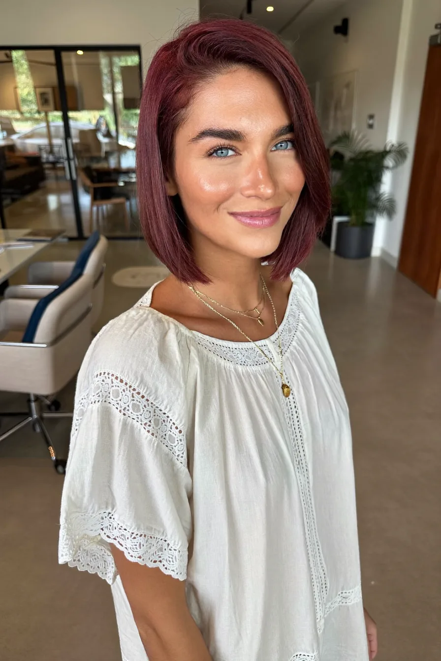 Sleek Straight Burgundy Bob With Deep Side Parting